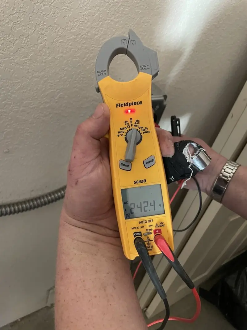 Voltage testing with clamp meter during Aluminum Wiring Replacement in Blakely